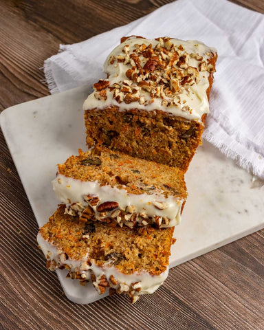 Carrot Cake Loaf with nuts and cream cheese frosting